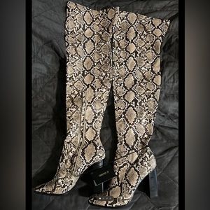 Brand new snakeskin pattern boots.